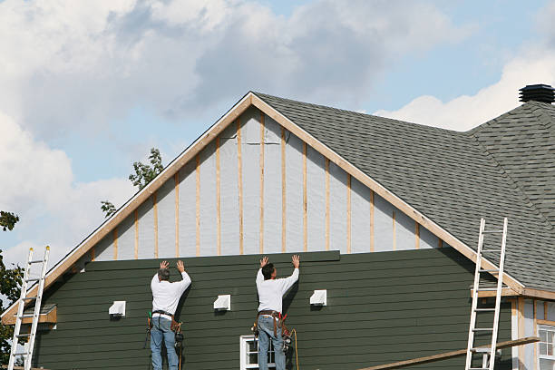 Professional Siding Contractor technician working in Newton Upper Falls, MA
